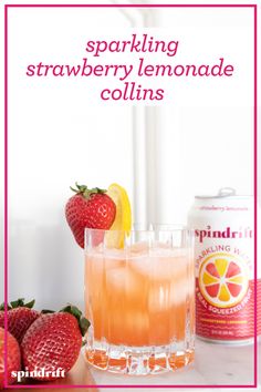 sparkling strawberry lemonade collinss in a glass next to strawberries