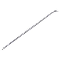 Iconic Art Deco platinum tennis bracelet, crafted by Cartier Paris, set with graduated in size old mine cut diamonds - total approx. 5cts G/VS-Si. Bracelet is 7 1/8" long and 4.3mm wide at the center (widest) point. Marked with faint hallmarks Cartier Paris and partially polished off serial number " LC L S" New York. Weight of the piece - 15.7 grams. Classic Cartier Bracelet With Single Cut Diamonds, Cartier Classic Diamond White Jewelry, Cartier Classic Silver Bracelets, Classic Diamond Bracelet By Cartier, Classic Cartier Diamond Bracelets, Classic Cartier Diamond Bracelet With Accents, Classic Cartier Diamond Bracelet With Diamond Accents, Classic Cartier Jewelry With Single Cut Diamonds, Classic Cartier Diamond Jubilee Bracelet