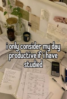 a desk with papers, pens and a calculator on it that says i only consider my day product if i have studded