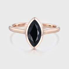 Discover sleek elegance with our Bezel Set Marquise Cut Black Onyx Ring in 14K Rose Gold, a symbol of style and sophistication. Bezel Set Marquise, Black Onyx Engagement Ring, Black Onyx Ring, Onyx Ring, Affordable Jewelry, Marquise Cut, Lab Diamonds, Bezel Setting, Gift For Women