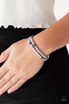 Classic silver beads, faceted purple beads, and dainty silver discs are threaded along stretchy bands, creating shimmery layers across the wrist.

Sold as one set of two bracelets. Rose Gold Beads, Purple Beads, Purple Bracelet, Paparazzi Accessories, Blue Gems, Paparazzi Jewelry, One Set, Faceted Bead, Vintage Accessories