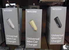 three different types of mini car chargers on display in a store or showroom for sale