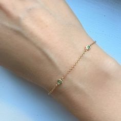 Five Station Emerald Bracelet 14K Yellow Gold Emerald 2mm each 7" LongLobster clapThank you for visiting our shop!Visit our website DmKJewelry.comAlso Follow us on Instagram https://www.instagram.com/dmkjewelry_/ Minimalist Yellow Gold Bracelet For May Birthstone, 14k Gold-filled Yellow Gold Bracelets With Birthstone, 14k Yellow Gold Filled Birthstone Bracelets, 14k Gold Filled Yellow Gold Bracelets With Birthstone, Yellow Gold Jubilee Bracelet With May Birthstone, Yellow Gold Jubilee Bracelet, May Birthstone, Minimalist Gold Bracelets With May Birthstone, Yellow Gold Jubilee Bracelet For May Birthstone, Station Bracelet