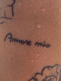 a tattoo with the words amoe mio written on it