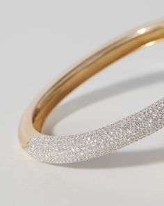 Classic: 14k solid gold 809 round, natural diamonds: Total carat weight: approximately 3.99 Color: G-H Clarity: SI Diamond coverage: halfway around bangle Width: 6 mm Oval, hinged bangle Push clasp closure Dazzling Diamond Bangle Bracelet With Pave Setting, Formal 14k Gold Diamond Bangle Bracelet, Diamond White Diamond Bangle With Pave Setting, Classic Gold Bangle Bracelet With Pave Setting, Fine Jewelry Diamond Bracelet With Pave Setting, Diamond Bracelet With Pave Setting, Diamond Bangle With Pave Setting, Dazzling Round Diamond Bracelet With Pave Setting, White Round Bangle With Pave Setting