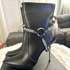 Brand New Black And Silver Ankle Boots. Size 10. Chic Boots With Chain Strap For Night Out, Chic Chain Strap Boots For Night Out, Elegant Boots With Chain Strap For Night Out, Chic Silver Boots With Metal Feet, Trendy Chain Boots For Party, Trendy Party Boots With Chain Detail, Party Boots With Chain Detail, Silver Boots With Metal Feet For Night Out, Trendy Party Boots With Metal Feet