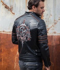 This dope vintage-styled leather jacket features a skull with a sword through it with classic cafe racer trimmings • Genuine cowhide leather & suede, full pelt• Zipper closure• Stand up collar• Polyester lining material Delivery: 2-4 weeksThis product ships to you directly from our overseas supplier Please send us your measurements for a perfect fit (see chart below), or tell us your height & weight and we'll help you choose your correct size Leather Jacket With Rivets For Biker Events, Gothic Leather Jacket For Winter Biker Events, Gothic Leather Outerwear For Biker Events, Winter Gothic Leather Jacket For Biker Events, Biker Leather Jacket With Rivets For Biker Events, Biker Leather Jacket With Rivets, Biker Style Leather Jacket With Rivets For Biker Events, Rocker Leather Jacket For Biker Events, Rocker Style Leather Jacket For Biker Events