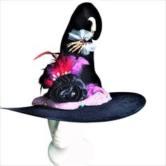 Black Halloween Witchy Hat, Large Brim, Decorated With Multicolor Feathers, Handcrafted Flowers, Bows, Gauze And Beads Hat Band. One Size Fits All. Handcrafted, New, Never Worn. Witchy Costume Hats And Headpieces For Party, Handmade Purple Party Hat, Purple Costume Hats And Headpieces For Halloween, Whimsical Black Hats For Themed Events, Whimsical Black Hat For Themed Events, Whimsical Purple Halloween Costume Hats And Headpieces, Whimsical Purple Costume Hats For Halloween, Whimsical Purple Halloween Costume Hat, Black Hat For Mardi Gras Party