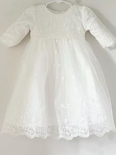 A timeless heirloom, our gorgeously made vintage inspired gown is perfect for your little's special event. Featuring delicate lace, made perfect with a cotton/linen liner to ensure comfort. This is a complete set consisting of the gown and coordinating bonnet. Elegant Long Sleeve Fitted Baptism Dress, Elegant Fitted Long Sleeve Baptism Dress, Classic Baptism Gown With Lace Trim, Elegant White Long Sleeve Baptism Dress, Classic Fitted Baptism Dress With Lace Bodice, Cream Baptism Dress With Fitted Bodice, Cream Baptism Gown With Fitted Bodice, Classic White Baptism Dress For Ceremonies, Classic Formal Baptism Dress With Fitted Bodice