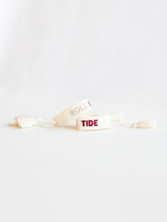 Introducing our game day collection! White embroidered bracelet with red + silver letters. Our embroidered bracelets are adjustable to fit any wrist! Final Sale: This item is final sale and not eligible for returns. Please double check your wrist size and any details prior to ordering. xo - We appreciate your understanding! Casual White Wristband For Game Day, Adjustable Team Spirit Friendship Bracelets For Game Day, Casual Adjustable Wristband For Game Day, White Embroidered Bracelet As Gift, Adjustable White Friendship Bracelets For Game Day, White Embroidered Bracelets For Friendship, Embroidered Bracelet, Roll Tide, Take A Shower