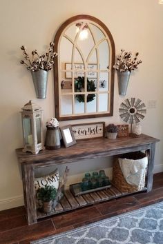 the entryway is decorated with vases, mirrors and other things to decorate it