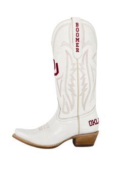 Women's Collegiate Gameday Boots in Ivory ALL BOOTS ARE PREORDER! If the wholesaler has the boots in stock on their end, shipping takes approximately 1-2 weeks. If the wholesaler does NOT have the boots in stock, shipping takes approximately 4-6 weeks. I will let you know asap whether or not the boots you ordered are in stock. Thank you for understanding! Find more teams here! Details Premium Genuine Ivory Leather Goodyear Welt Construction Memory Foam Insole Smooth Leather Lining Natural Stacke White Embroidered Boots For Fall, White Almond Toe Boots With Branded Insole, Classic White Snip Toe Boots, White Embroidered Round Toe Boots, Red Dawg Boots, Cowboy Boot Gameday Outfit, White Embroidered Snip Toe Boots, Game Day Boots Ribbon, Game Day Cowboy Boots