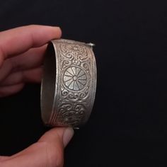 Hand engraved in southern Morocco. Jewish bracelet. Exquisite engraving and an excellent bracelet. And in good condition. And it opens too. And fast shipping *weight: 54.4 gram *height: 2.4 cm If there is any other question send me a message and i will be very happy to answer it as son as possible. Visit my store: https://www.etsy.com/fr/shop/Berberjewelery * note : Please, when purchasing, it is necessary to send your phone number.    Thank you Traditional Silver Carved Cuff Bracelet, Traditional Etched Round Cuff Bracelet, Ceremonial Engraved Antique Silver Bangle, Traditional Silver Stamped Bangle, Traditional Etched Antique Silver Bracelets, Traditional Stamped Bangle For Wedding, Antique Silver Etched Bracelets, Antique Engraved Silver Cuff Bracelet, Silver Etched Antique Bangle