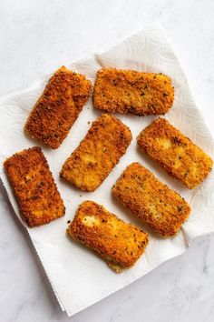 some fried food is on a white paper towel