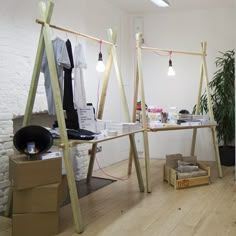 an office with two wooden ladders on the floor