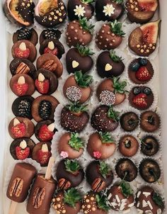 a box filled with lots of chocolate covered treats