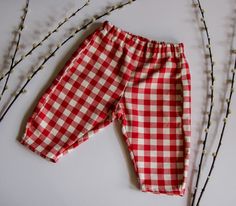 Red Gingham Pants Boy Gingham Pants Gingham Bubble Trousers Unisex Plaid Trousers Gingham Bubble Pants for Children  These red gingham pants are unisex, have a modern slouchy shape and they are as comfy as they look. The comfortable fit offers plenty of room for movement and play and ensures an array of different styling options. Made in a thick gingham cotton. Whether you're looking for a special gift for a loved one or a unique pants for your own child's special day, this handmade unisex plaid Red Bottoms For Spring Picnic, Red Spring Bottoms For Picnic, Plaid Cotton Bottoms For Picnic, Unique Pants, Gingham Pants, Tiny Studio, Plaid Trousers, Red Gingham, Kids Pants