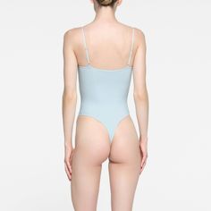 With its wide scoop neckline and low back providing the perfect foundation under clothing, this Cami Bodysuit is an essential wardrobe foundation. Featu... Under Clothing, Cami Bodysuit, Essential Wardrobe, Perfect Foundation, High Cut, Low Back, Scoop Neckline, Wardrobe Essentials, Opal