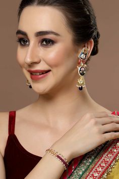 Product Features: Color: Blue, Pink, Gold, White Material: Alloy Metal Design: Kundan, American Diamonds, Pearls, Natural Stones Other Details: Gold-Plated Dimension: Length of Earring= 10 CM; Width of Earring =2.8 CM; Length of Kanchain =10 CM; Width of Kanchain = 1 CM; Adjustable - No Occasion: Party Product Type: Hair Chain Disclaimer: There will be slight difference in digital to actual image Earrings With Hair Chain, Diamond Jhumkas, One Minute Saree, Hair Chain, Hair Chains, Purple Pearl, Innovative Fashion, Jhumka Earrings, Diamond Shop