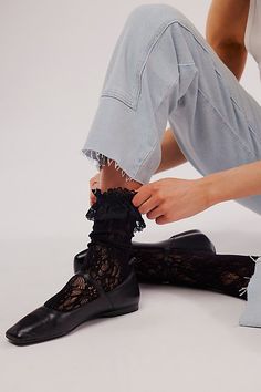 Just as effortless as they are essential, these so cool socks are featured in a mid-calf rise and sheer lace fabrication with ruffled top trim for a special finishing touch. **Features:** Sheer mesh lace fabrication, defined rifle detail at top, scrunch-able style **Why We ❤ It:** The ideal blend of sweet and sultry, these go-with-anything socks are sure to make the perfect subtle touch when paired with absolutely any style. | Embrace Lace Tall Socks by Free People in Black Black Lace Socks, Socks Aesthetic, Blue Stockings, Tall Socks, Clothes Wishlist, Lace Socks, Ruffled Top, Cool Socks, So Cool