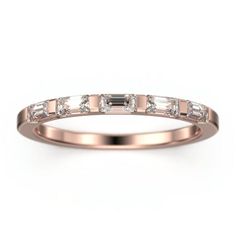 a rose gold wedding band with baguettes