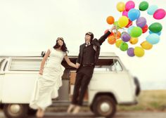 a bride and groom holding balloons in front of a vw van with the words, destination groonals on it