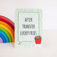 there is a card with the words after transfer lucky fries on it and a rainbow in the background