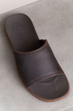 Men's OluKai Alania Slide Leather Sandals | Overland Leather Slides With Leather Footbed For Beach, Leather Flip Flops With Cushioned Footbed For Outdoor, Casual Leather Slides With Leather Footbed, Leather Flip Flops With Rubber Sole For Outdoor, Comfortable Leather Slide Sandals, Outdoor Leather Flip Flops With Rubber Sole, Brown Leather Beach Sport Sandals, Leather Slide Sport Sandals For Outdoor, Leather Slide Flip Flops For Outdoor