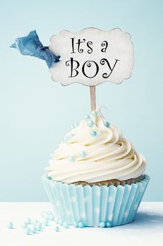 it's a boy cupcake with frosting on top