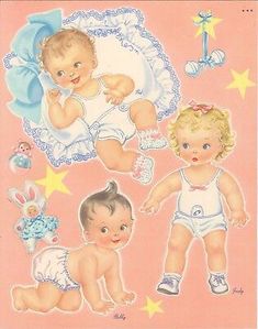 two babies in diapers and one is holding a baby's hand with stars on it