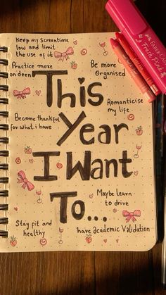 this year i want to be written on a notebook with markers and pens next to it