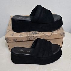 Free People Almost Paradise Platform Blk/Noir 3 Size 38 Eu 8 66684663 Take Every Step In Style And Confidence Wearing Free People Almost Paradise Platform Heels. Textile Upper. Leather Lining And Insole. Slip-On Closure. Brand Logo On Insole. Platform Heel. Open Round Toe. Synthetic Outsole. Imported. Product Measurements Were Taken Using Size Eu 38 (Us Women's 8), Width M. Please Note That Measurements May Vary By Size. Measurements: Heel Height: 2 12 In Platform Height: 1 34 In Black Suede Sandals With Cushioned Footbed, Black Suede Sandals With Textured Footbed, Black Suede Platform Sandals, Black Suede Wedge Heel Sandals, Black Wedge Heel Sandals With Textured Sole, Comfortable Black Suede Sandals, Black Suede Sandals With Removable Insole, Black Suede Sandals Medium Width, Black Medium Width Suede Sandals