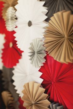 an image of some red and white paper fans