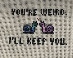 a cross stitch pattern with the words you're weird, i'll keep you