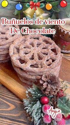 an image of some food on a table with christmas decorations and lights in the background