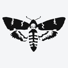 a black and white drawing of a moth