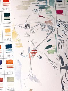 some watercolors are being used to create an art project