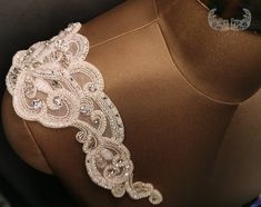 "These gorgeous bridal straps (set of 2) are made of rhinestones, pearls and beads on tulle base.  The price is for a set of two pieces of the product. Dimensions: Length - 18 inches Width at centre (from top till the end of beading)  - 3 inches Width at edge - 1/2 inch Length from centre towards back- 8 inches Length from centre to the front- 10 inches  The straps come without any hook or eye and can be stitched to the gown, but we can add hooks at each end to make detachable. If required to be stitched, we can leave extra fabric at edge. COMES WITH A SURPRISE GIFT! Customisation in length and color available with additional charges. PLEASE CONTACT US BEFORE PURCHASE.   We at Krusna Design make the highest quality bridal accessories with meticulous attention to details and finishing. Ever Wedding Dress Straps, Straps Wedding Dress, Shoulder Jewelry, Dress Straps, Bridal Applique, Off Shoulder Gown, Hanging Beads, Wedding Dresses With Straps, Back Necklace