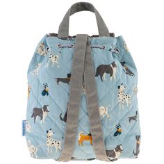 a blue backpack with dogs on it and grey straps, sitting against a white background