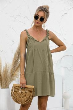 This summer tunic dress is perfect to dress up or down depending on your day. Easily pair this dress with your favorite leather sandals and summer accessories. MEASUREMENTS: Small - Chest & Waist: 35"-37"inMedium - Chest & Waist: 37"-39"inLarge - Chest & Waist: 39"-41"inXL- Chest & Waist: 41"-43"in Casual V-neck Mini Dress With Tie Straps, Casual Mini Dress With Tie Straps And V-neck, Casual Summer Mini Dress For Summer Outings, Summer Mini Dress For Outing, Spring Sundress With Tie Straps For Day Out, Summer Outing Mini Dress, Casual Midi Dress For Spring Outing, Spring Sundress For Outing, Casual Knee-length Sundress With Tie Straps