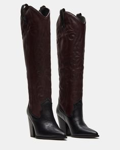 A Western boot is a requirement for any wardrobe and we’re obsessed with LASSO. This knee-high pair features whipstitching detail and a towering block heel. 3.75 inch heel height Size 6 measurements: 15 inch shaft circumference, 13.25 inch shaft height Size 8 measurements: 15.75 inch shaft circumference, 14.25 inch shaft height Size 10 measurements: 16.75 inch shaft circumference, 15 inch shaft height Leather and synthetic upper material Textile and synthetic lining Synthetic sock Synthetic sole Western Knee-high Boots With Stacked Heel, Western Wide Calf High Heeled Boots, Western Style Heeled Boots With Wide Calf, Western Style High Heel Boots For Wide Calves, Western Style Wide Calf Heeled Boots, Western Knee-high Wide Calf Platform Boots, Tall Leather Heeled Boots With Reinforced Heel, Western Block Heel Knee-high Boots For Fall, Wide Calf Knee-high Western Platform Boots