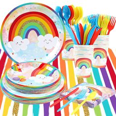 rainbow party supplies including plates, cups and utensils