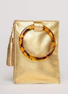 Beau & Ro Wristlet Metallic Gold / One Size The Acrylic Ring Wristlet | Gold Gold Shoulder Bag With Round Handle For Daily Use, Gold Bag With Removable Pouch And Round Handle, Gold Bag With Round Handle For Everyday Use, Gold Bags With Removable Pouch And Round Handle, Gold Leather Shoulder Bag With Round Handle, Gold Pouch Clutch For Daily Use, Gold Travel Bag With Round Handle, Chic Gold Leather Clutch, Gold Leather Pouch Clutch