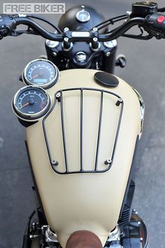 the handlebars and gauges are visible on this motorcyclist's motorcycle