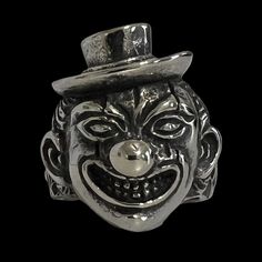 Introducing the Evil Clown Skull Ring - the last face you want to see when you shut your eyes at night. and a perfect piece of jewelry for horror movie fans. This ring features a detailed depiction of a twisted and evil clown, topped with his hat and ready to start the killing show!! Crafted with high-quality materials, this ring is both durable and comfortable to wear. The Evil Clown Skull Ring is a great accessory to complete your Halloween costume or to add a touch of spooky style to your everyday look. Its unique design is sure to turn heads and make a statement wherever you go. With its excellent craftsmanship and attention to detail, this ring is a must-have for any horror fan. Don't miss out on the chance to give your friends nightmares with this amazing piece of jewelry! Made from Clown Skull, Evil Clown, Spooky Style, Evil Clowns, 20 Gifts, Stone Collection, Skull Ring, Horror Movie, Necklace Sizes