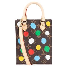 100% authentic Louis Vuitton x Yayoi Kusama Petit Sac Plat mini tote in Ebene Monogram canvas with multicolor 3D painted dots. Features natural cowhide-leather trim, gold-plated hardware and removable and adjustable shoulder strap. Lined in red cotton with an open pocket against the back. Has been carried and is in virtually new condition. Comes with dust bag, box and store receipt. Measurements Model M81867 Height 17cm (6.6in) Width 14cm (5.5in) Depth 5cm (2in) All our listings include only the Louis Vuitton X Yayoi Kusama, Yayoi Kusama, Louis Vuitton Shoulder Bag, Mini Tote, In 3d, Monogram Canvas, Authentic Louis Vuitton, Fashion Handbags, Cowhide Leather