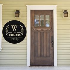 the front door to williams family winery with a sign that says,'welcome home '