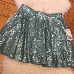 Short And Cute Mini Skirt Size Xs. Sequined Throughout. Forever 21. Nwt Waist Measures 12.5 Inches Flat. Length Is 15 Inches Flat. Spring Party Flared Skort, Fitted Flared Skirt With Sequins, Spring Sequin Short Skirt, Fitted Skort For Party Season, Spring Party Skort, Forever 21 Mini Skort For Party, Forever 21 Mini Length Party Bottoms, Forever 21 Mini Length Bottoms For Party, Forever 21 Mini Length Skirt For Party