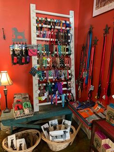 a room filled with lots of different types of ribbons on display next to each other