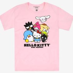 a pink hello kitty and friends t - shirt with the words hello kitty and friends on it